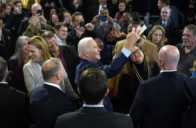 Special Agent Lane, (top right) appears in very close proximity to Joe Biden at the LIUNA Training Center, Wednesday, Feb. 8, 2023, in DeForest, Wisconsin.